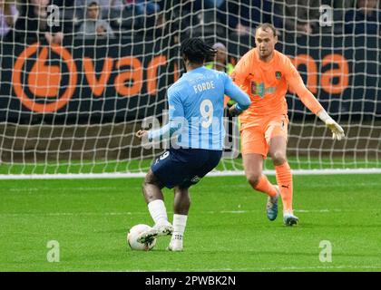 Shaqai Forde of York City scores the first goal for his team and ...