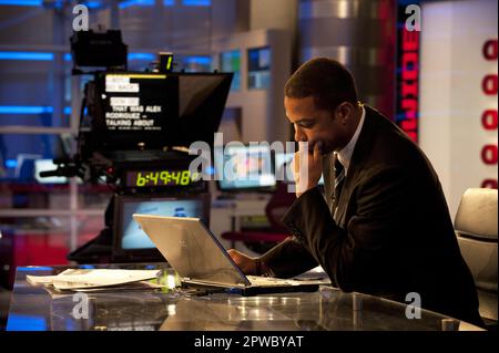 Atlanta, Georgia, USA. 27th July, 2011. CNN anchor DON LEMON works on a ...