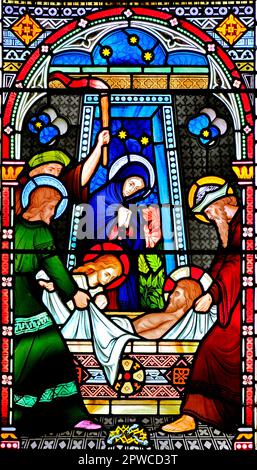 Joseph of Arimathea, and Nicodemus, lay body of Jesus in Tomb, Old Hunstanton, detail of stained glass window, by Frederick Preedy, 1867, Norfolk Stock Photo