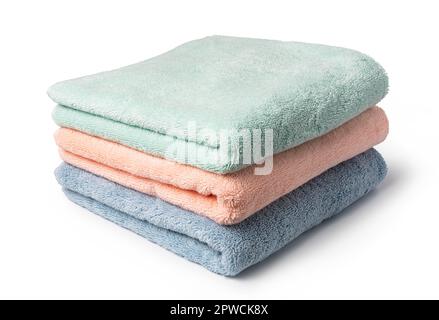 Stack of towels on a white background Stock Photo