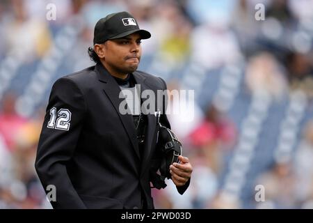 Major League umpire Erich Bacchus looks on during the game between News  Photo - Getty Images