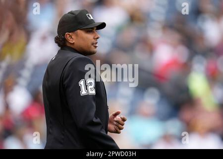 Major League umpire Erich Bacchus looks on during the game between News  Photo - Getty Images