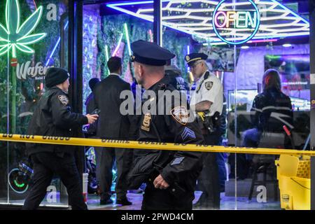 Manhattan, New York, USA. 29th Apr, 2023. Police officers seen during the investigation. Police investigate the shooting incident. Shooting in Manhattan, New York, United States on April 29, 2023. At 17:43 Saturday evening one person was shot in the hip and shoulder near the area of 9th Avenue and West 46th Street. According to the New York City Police Department, the person shot is in stable condition. No suspects are captured at this time. Credit: SOPA Images Limited/Alamy Live News Stock Photo