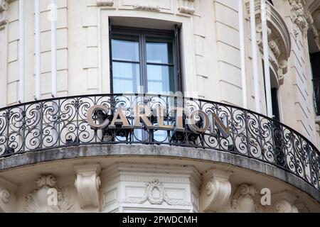 lyon , Aura France - 04 24 2023 : Carlton text brand and logo sign on wall facade hotel luxury balcony signboard in lyon french city Stock Photo