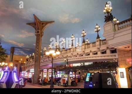 Interior of Paris Las Vegas Hotel and Casino built to resemble Paris, France with a bridge and streetlights, with video slot machines in Las Vegas. Stock Photo