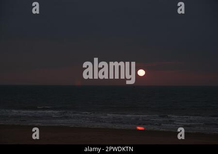 Sunset over the North Sea, from the beach in Ostend, Belgium. Stock Photo