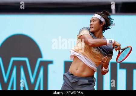 Zhizhen Zhang of China in action against Denis Shapovalop of Canada during the Mutua Madrid Open 2023, Masters 1000 tennis tournament on April 29, 2023 at Caja Magica in Madrid, Spain - Photo: Oscar J Barroso/DPPI/LiveMedia Stock Photo