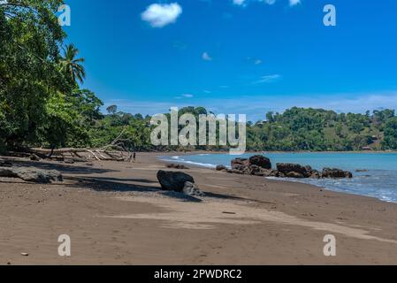 Sandy beach of the small town of Drake Bay, Puntarenas, Costa Rica Stock Photo