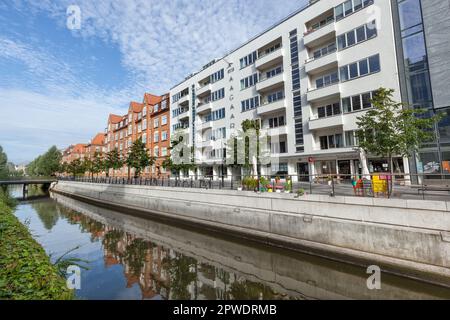 Shops, restaurants, cafes, bars and offices on Aboulevarden by River Aarhus riverside in city centre, Aarhus Denmark. Stock Photo