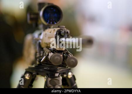 Optical sight on a sniper rifle. Optical sight on the weapon Stock Photo