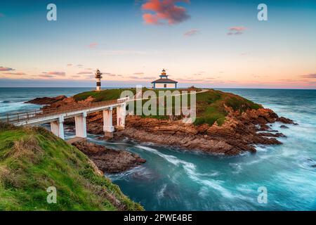 Beautiful Isla Pancha lighthouse in the town of Ribadeo, Galicia, Spain ...