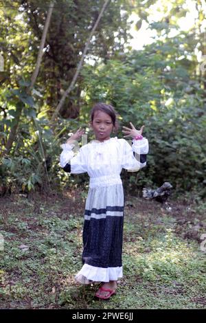 Madiun, Indonesia-April 25, 2023: little asian boy and girl smiling facing the camera. Stock Photo