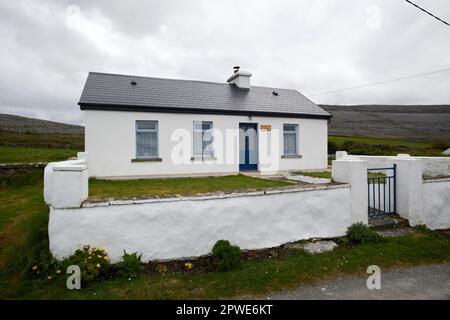 old irish stone cottage refurbished and turned into a holiday let in the burren county clare republic of ireland Stock Photo