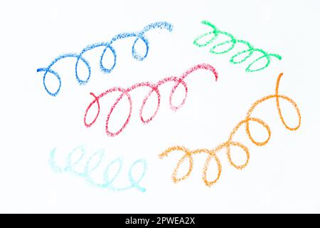 Colorful oil pastel hand drawing in curve or wavy line shape on white paper background Stock Photo