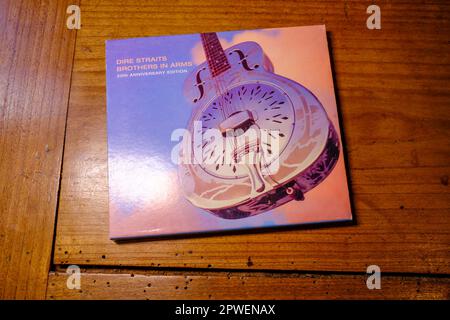 NEW ORLEANS, LA, USA - APRIL 28, 2023: Front cover of the 20th Anniversary Edition of the 'Brothers in Arms' compact disc by Dire Straits Stock Photo