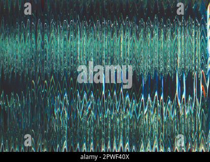 Glitch texture background. Distortion noise. Frequency error. Green blue red color vibration artifacts on dark black abstract illustration poster. Stock Photo