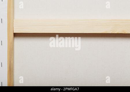Canvas for artists stretched on a wooden rail, as a background Stock Photo