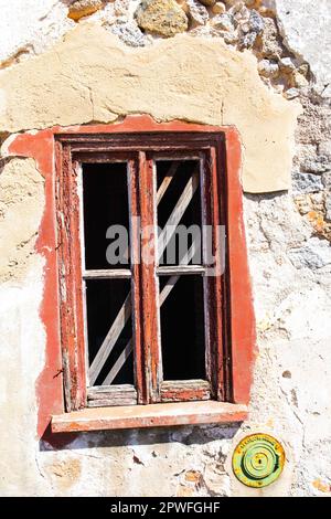 Old window in derelict house. Stock Photo