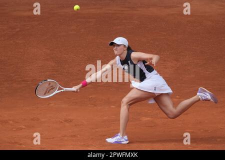 Madrid, Spain. 30th Apr, 2023. Iga Swiatek of Poland plays against Bernarda Pera of United States during the women's third round match on Day Seven of the Mutua Madrid Open at La Caja Magica in Madrid. Credit: SOPA Images Limited/Alamy Live News Stock Photo