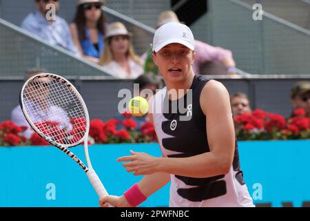 Madrid, Spain. 30th Apr, 2023. Iga Swiatek of Poland plays against Bernarda Pera of United States during the women's third round match on Day Seven of the Mutua Madrid Open at La Caja Magica in Madrid. (Photo by Atilano Garcia/SOPA Images/Sipa USA) Credit: Sipa USA/Alamy Live News Stock Photo