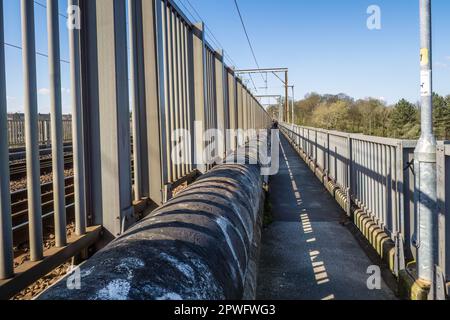 19.04.023 Lancaster, Lancashire, UK.The Carlisle Bridge is the main railway bridge crossing the River Lune at Lancaster, Lancashire, England, carrying Stock Photo