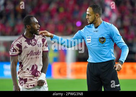 St. Louis, USA. 29th Apr, 2023. Referee Ismail Elfath talks to Portland Timbers player Franck Boli (7). STL City played the Portland Timbers in a Major League Soccer game on April 29, 2023 at CITY Park Stadium in St. Louis, MO, USA. Photo by Tim Vizer/Sipa USA Credit: Sipa USA/Alamy Live News Stock Photo