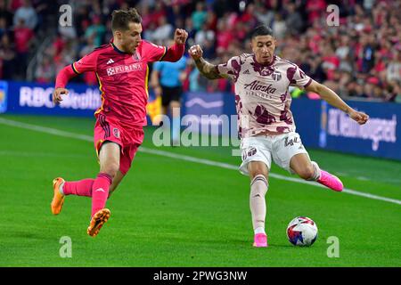 St. Louis, USA. 29th Apr, 2023. St. Louis City midfielder Indiana Vassilev (19, left) tries to block a shot by Portland Timbers midfielder Marvin Loría (44). STL City played the Portland Timbers in a Major League Soccer game on April 29, 2023 at CITY Park Stadium in St. Louis, MO, USA. Photo by Tim Vizer/Sipa USA Credit: Sipa USA/Alamy Live News Stock Photo