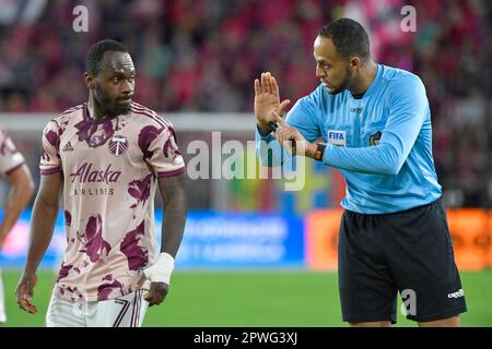 St. Louis, USA. 29th Apr, 2023. Referee Ismail Elfath talks to Portland Timbers player Franck Boli (7). STL City played the Portland Timbers in a Major League Soccer game on April 29, 2023 at CITY Park Stadium in St. Louis, MO, USA. Photo by Tim Vizer/Sipa USA Credit: Sipa USA/Alamy Live News Stock Photo