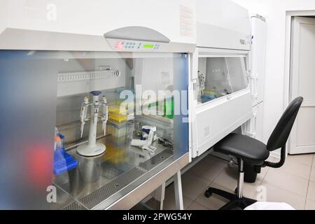 Work in a laminar box. Laboratory equipment for the study of cell cultures. Stock Photo