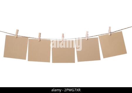 Clothespins with empty notepapers on string against white background. Space for text Stock Photo