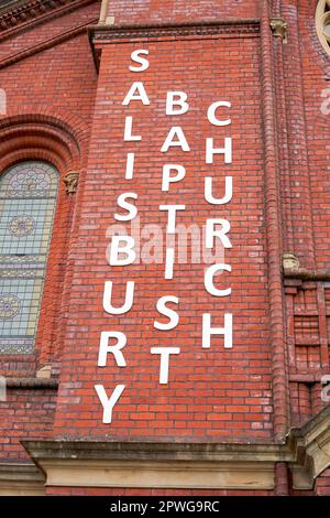 Salisbury Baptist Church in large white letters on red brick Stock Photo