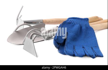 Pair of gloves and gardening tools on white background Stock Photo