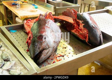 tuna fish on a slab in market in Loule Algarve portugal Stock Photo