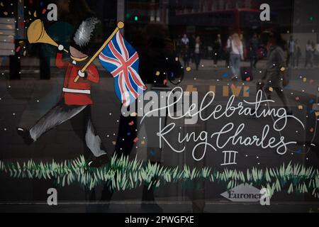 London, UK. 30th Apr 2023. A window has been decorated to clebrate the coronation of King Charles III, which will take place  on May 6th, 2023. Credit: Kiki Streitberger /Alamy Live News Stock Photo