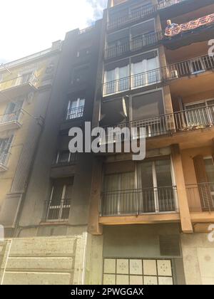 Black burnt building facade after a fire incident in a urban cityscape scene Stock Photo