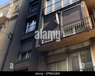 Black burnt building facade after a fire incident in a urban cityscape scene Stock Photo