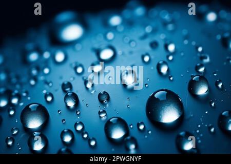 Water drops on blue background texture Stock Photo