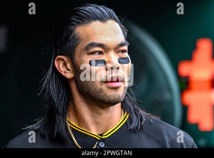 Pittsburgh Pirates' Connor Joe walks in the dugout before a