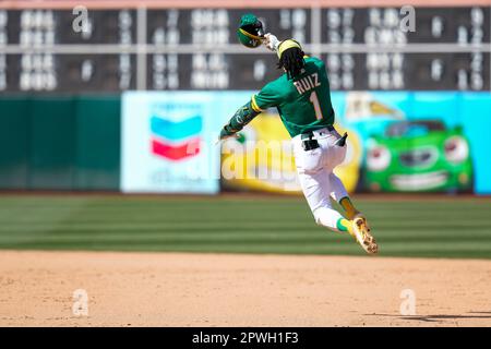 Carlos Perez of the Oakland Athletics celebrates in the dugout