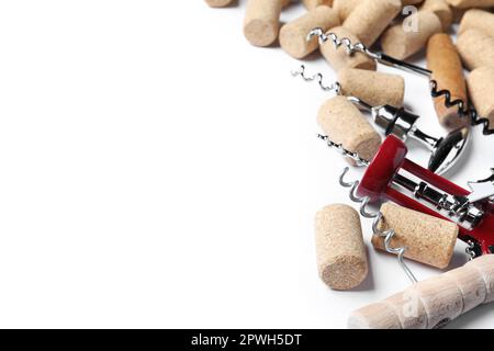 Different corkscrews and wine bottle stoppers on white background Stock Photo