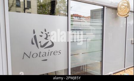 lyon , Aura France - 04 24 2023 : Notaire entrance door french sign text and logo notary office building wall facade Stock Photo