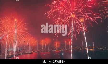 Celebrating New Year Holidays. Majestic Salute Over Coastal Cityscape at  Night. Happy Christmas Time with Colorful Fireworks Stock Photo - Alamy