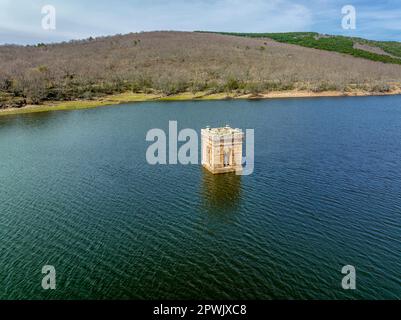 Cuerda del Pozo reservoir on the Duero river view of the bell tower of the church of La Muedra Soria province Stock Photo