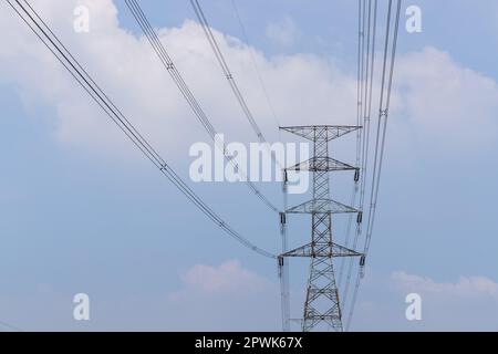 High voltage transmission towers line Stock Photo