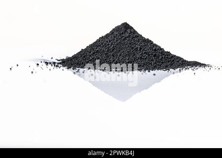 Iron nanoparticles in a lab, on a white glossy surface Stock Photo