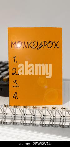 Writing displaying text Monkeypox, Word Written on poxvirus of Africa caused by chiefly in wild rodents and primates Stock Photo