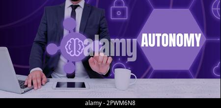 Hand writing sign Autonomy, Business overview vehicle that can guide itself without human conduction Stock Photo