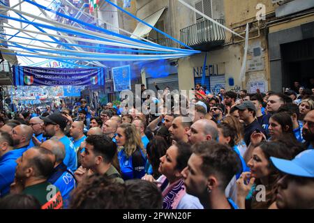 April 30, 2023, Naples, Campania/Napoli, Italy: Naples, Italy - April 30, 2023: In the football match between Napoli and Salernitana, of the Italian Serie A football Championship, the final result of 1 - 1, allows Napoli to earn another point in the general ranking and to be at a distance of Lazio, second in the standings by 18 points. With the chance to win mathematically after 33 years his third title of the Italian football championship a few days from the end. Fans celebrated in the historic district of Forcella and in the rest of the city.Fans follow the football match on TV during t Stock Photo