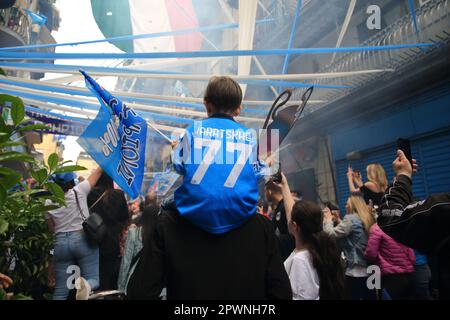 Naples, Italy - April 30, 2023: In the football match between Napoli and Salernitana, of the Italian Serie A football Championship, the final result of 1 - 1, allows Napoli to earn another point in the general ranking and to be at a distance of Lazio, second in the standings by 18 points. With the chance to win mathematically after 33 years his third title of the Italian football championship a few days from the end. Fans celebrated in the historic district of Forcella and in the rest of the city.Child wearing the jersey of Naples during the celebrations. (Photo by Pasquale Senatore/Pacif Stock Photo