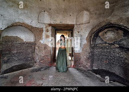 Nandini Singh, a female model poses for photos at the old fort near of the iconic Tajmahal. Stock Photo